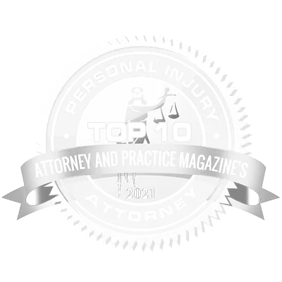A high-resolution silver and white seal for "Attorney and Practice Magazine's 2021 Top 10 Personal Injury Attorney," featuring a Lady Justice icon with scales and a sword on a transparent background, representing elite legal industry recognition and award-winning personal injury representation.