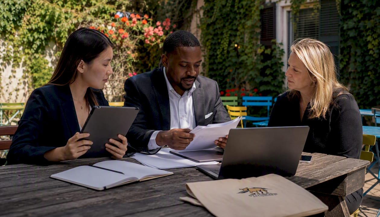 Boutique firm lawyers in team meeting