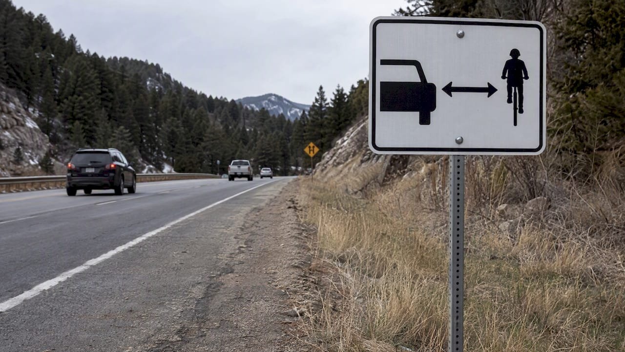 Colorado bicycle passing clearance sign roadside